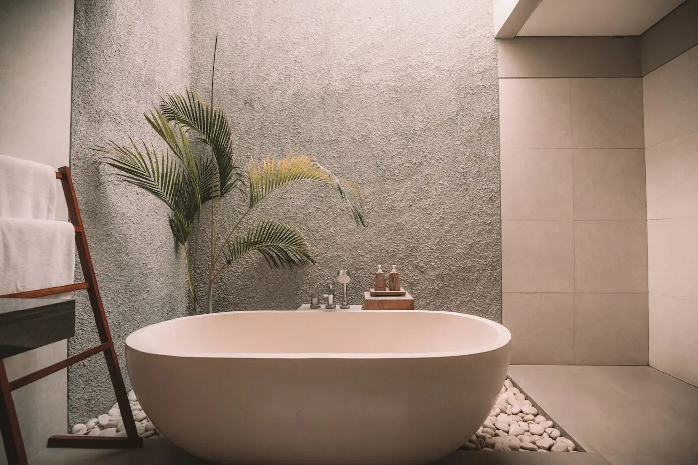 Serene spa bathroom with a freestanding tub and soft natural light